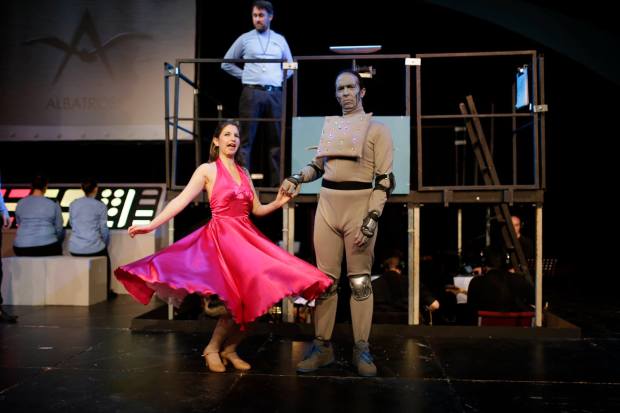 Arial and Miranda dance, while Bosun Arras looks on; photo by Timothy Winn